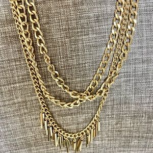 Gold tone multi chain necklace